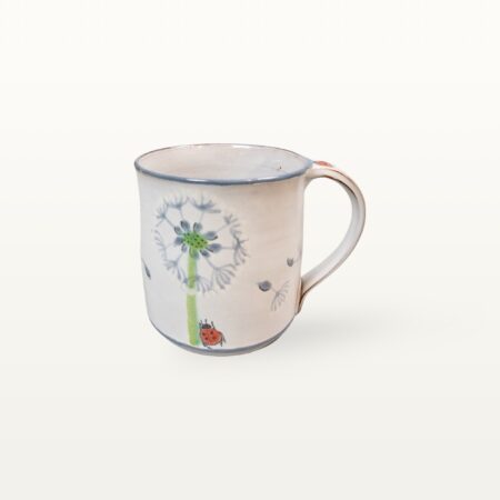 Sommerlicher Kaffeepott mit Pusteblume